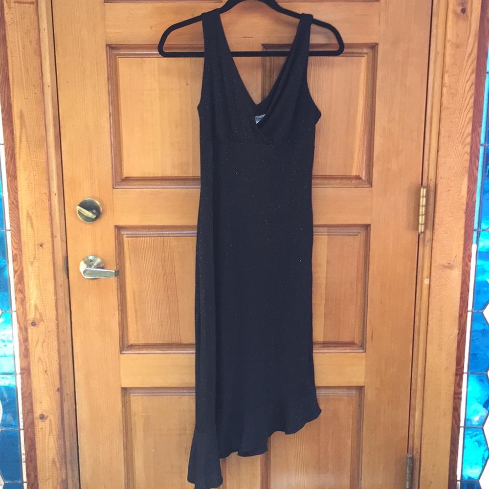 Black sleeveless dress.